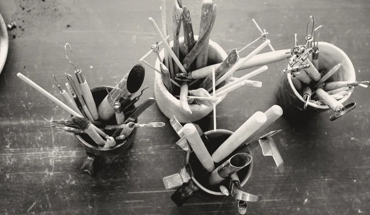 An artist studio with tools on the workbench.